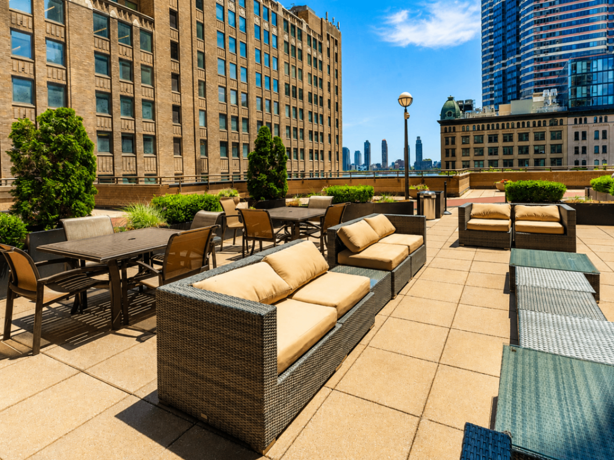 Outdoor sky terrace seating area at The Corinthian